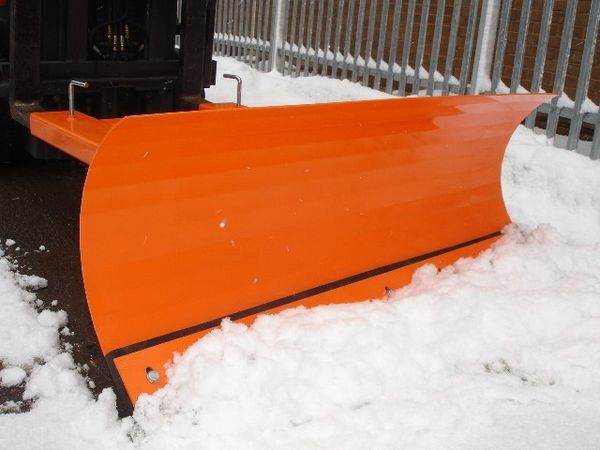 Snow plough attachment on forklift truck front veiw