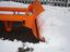 Snow plough attachment on forklift truck side veiw