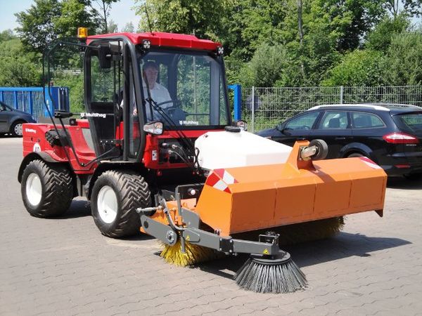Multihog fitted with Hydraulic Sweeper, c/w hydraulic tipper and water spray system. Used for general yard tidying, estate roads and footpaths etc